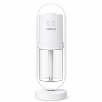 White humidifier with clear water tank on a white background