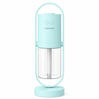 Mint green humidifier with clear water tank on a white background