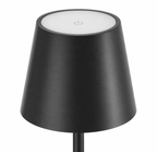 Black lamp with a white top on a white background