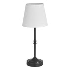 Table lamp with a white shade and black base on a white background