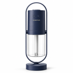 Navy blue humidifier with clear water tank on a white background