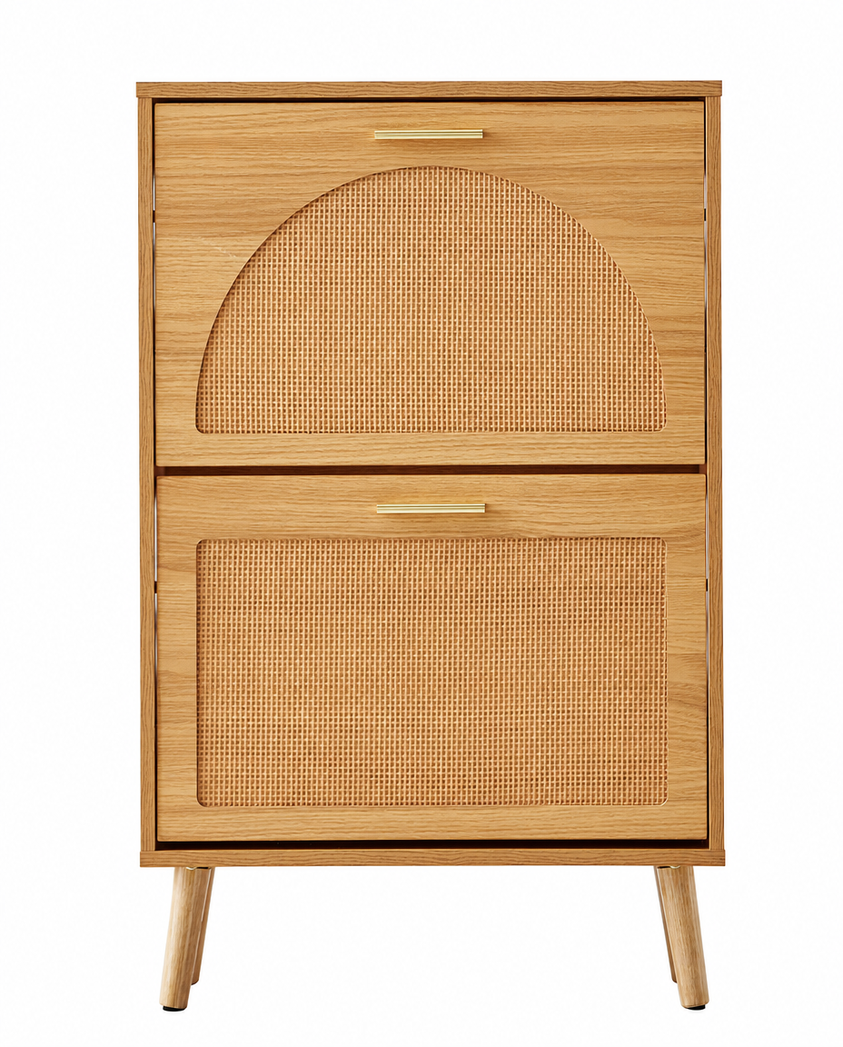 A mid-century modern two-drawer wooden cabinet with a natural wood finish, woven cane panels on the front, and slim brass handles, shown on a plain white background.