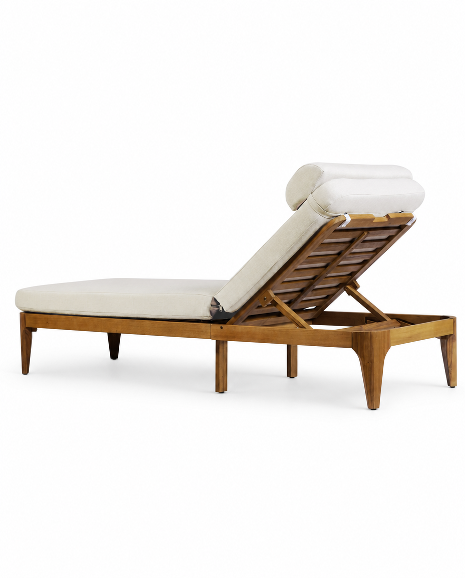 A mid-century modern wooden chaise lounge chair with cream-colored cushions and a matching rolled lumbar pillow, shown on a clean white background.