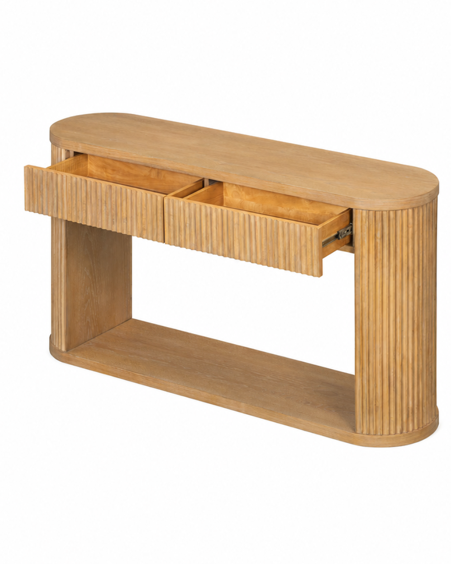 A light natural wood console table with a rounded top, ribbed drawer front with one open drawer, and a lower open shelf, shown on a plain white background.