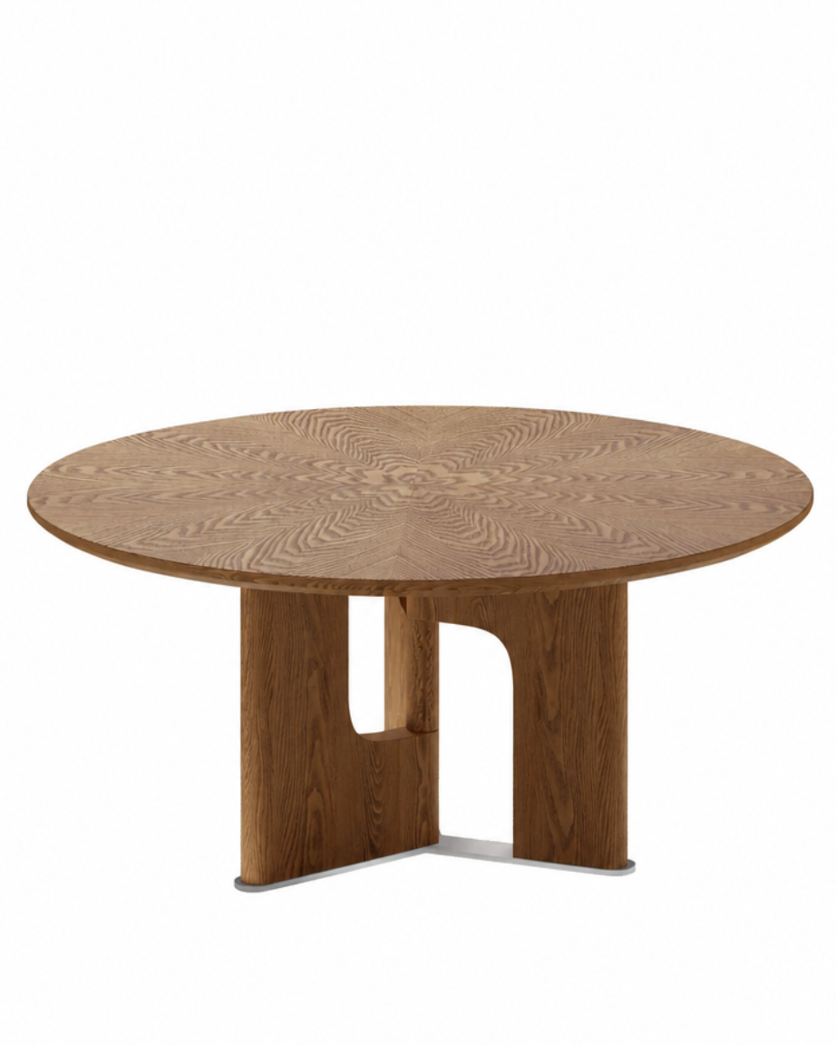 A round wooden dining table with a natural oak grain finish and a sculptural three-legged base, shown on a solid white background.
