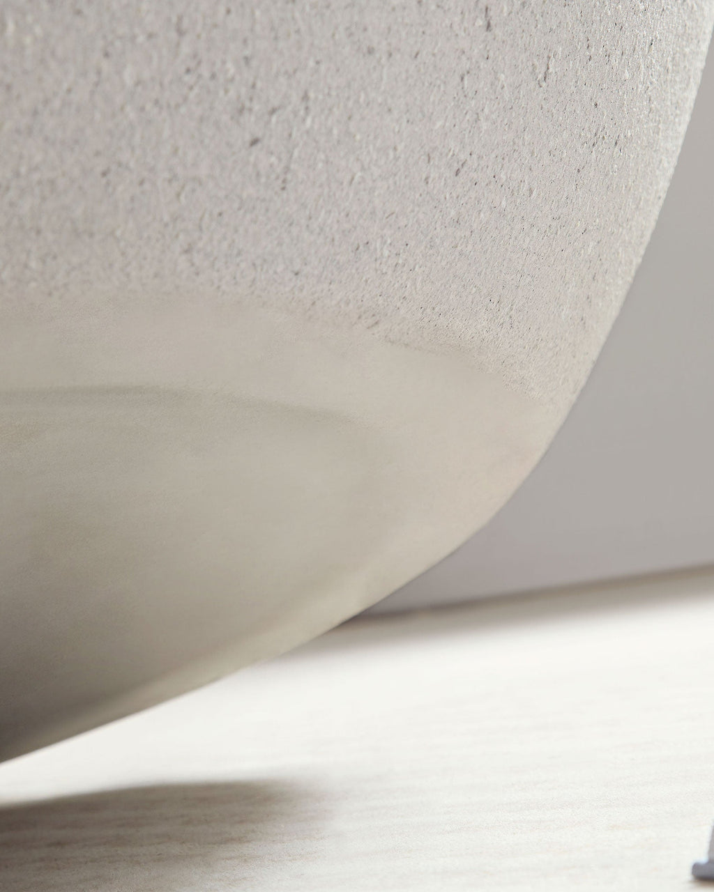 Close-up of a textured white ceiling panel