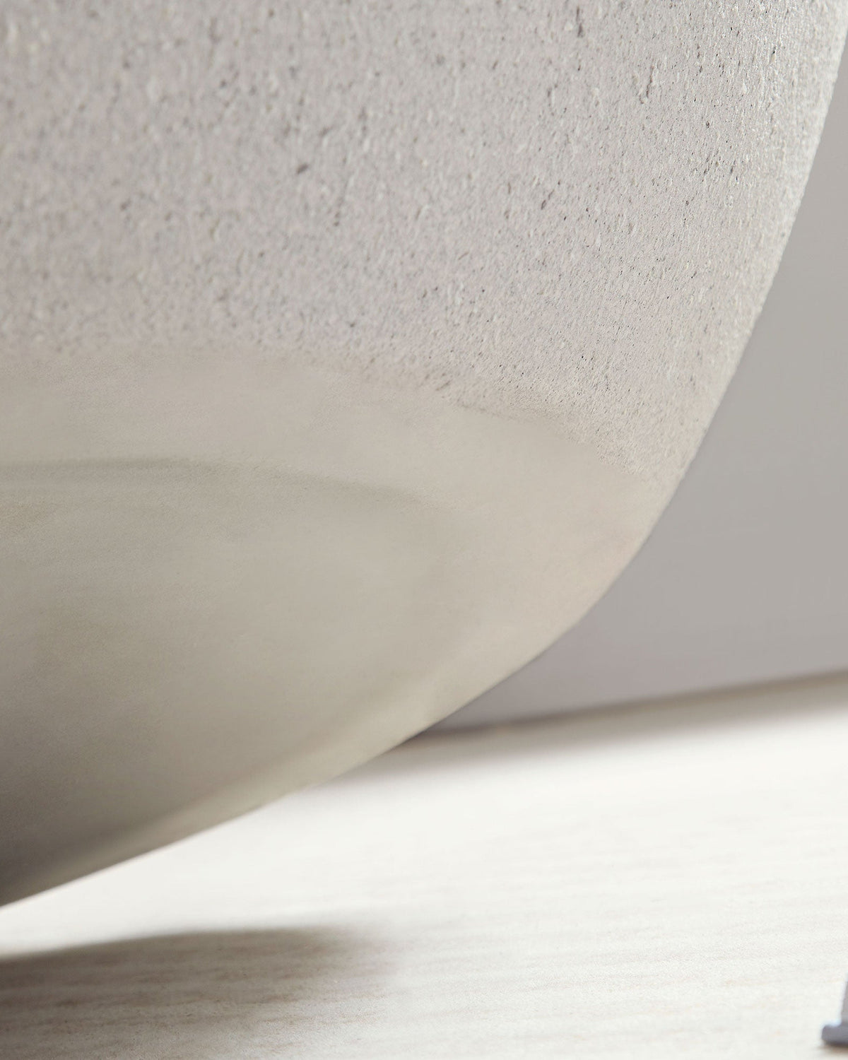 Close-up of a textured white ceiling panel